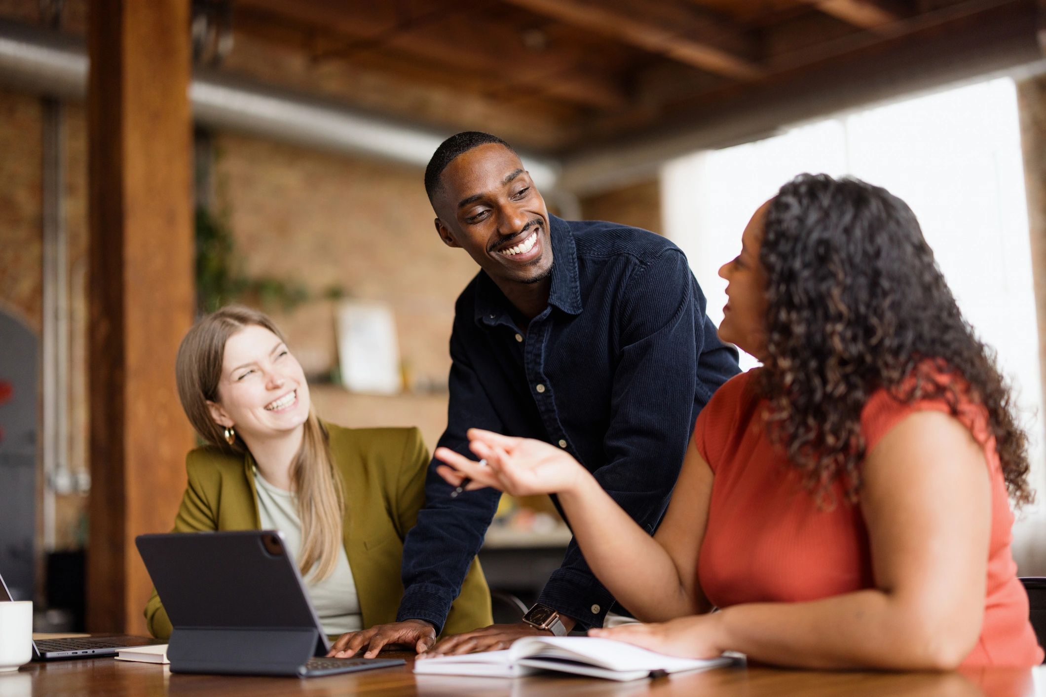 Technology professionals collaborating in an office meeting